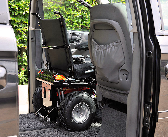 close up of a powerchair in position in a vehicle